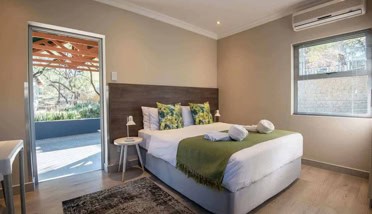 Small Self-Catering Chalet | One Queen Bed | Affordable Self-Catering Accommodation In Windhoek | Arebbusch Travel Lodge